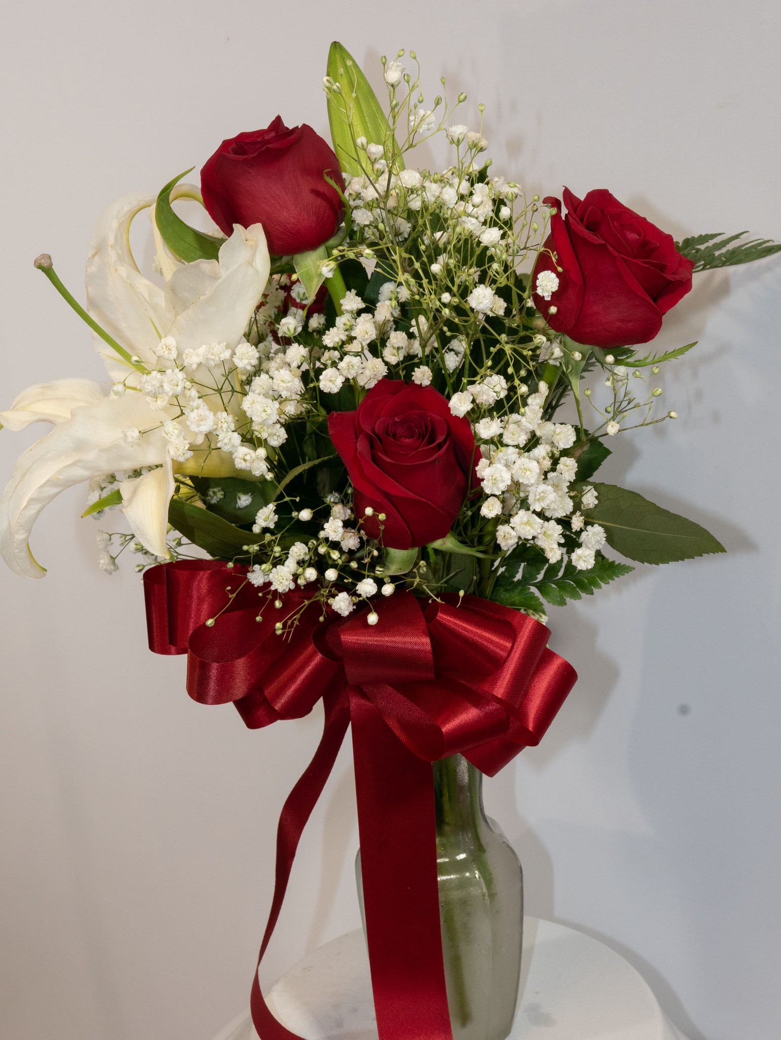 4 Rose Bud Vase with White Lilies - Roseland Flower & Nursery